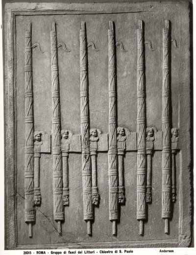 Relief depicting a group of lictors fasces by Roman Roman